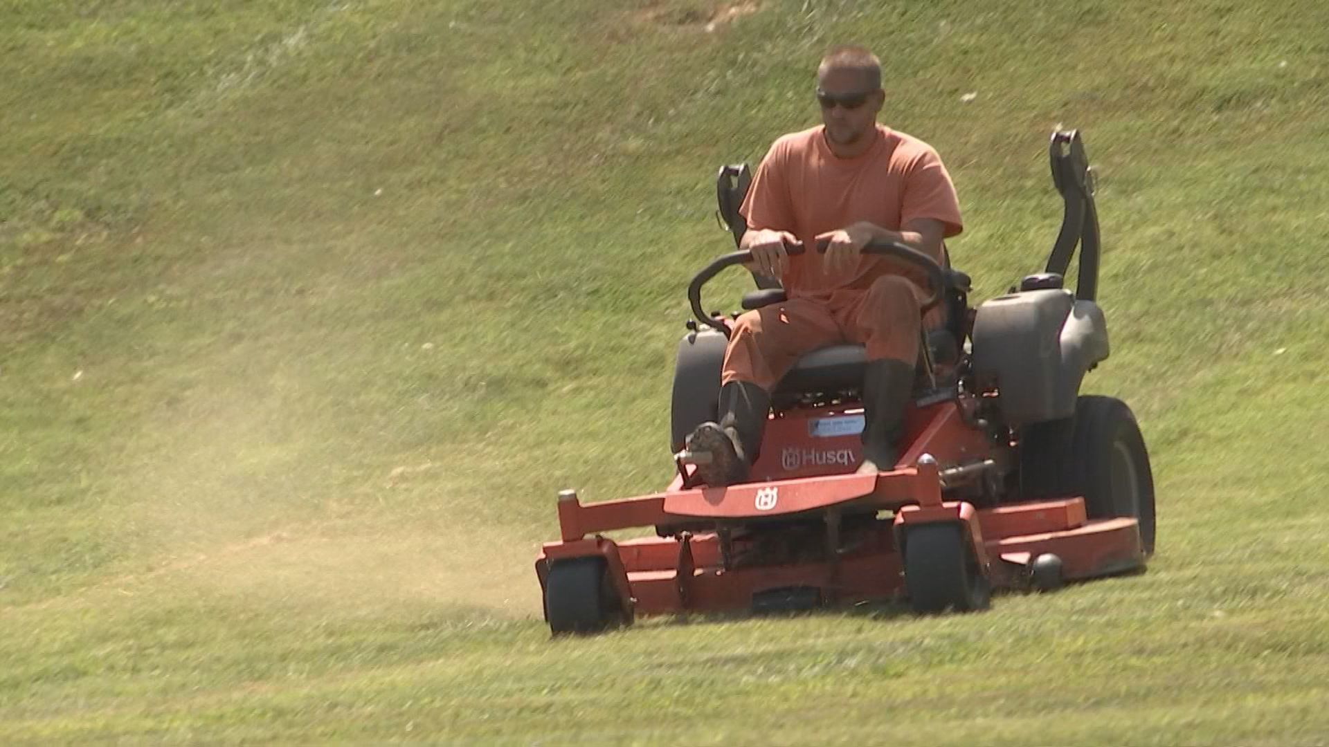 Inmate mowing